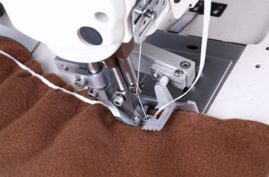 Program control, differential, abutted seam sewing machine